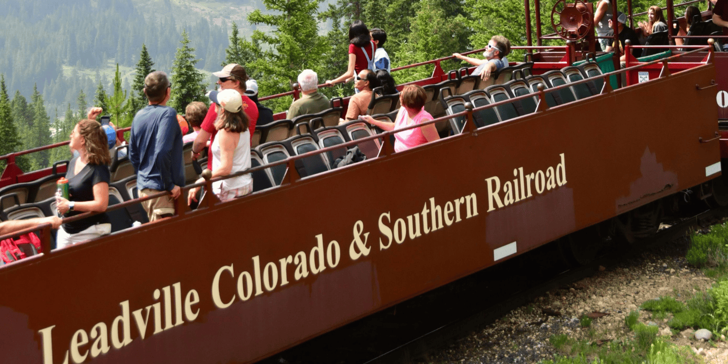 people on a Leadville Train ride in the mountains